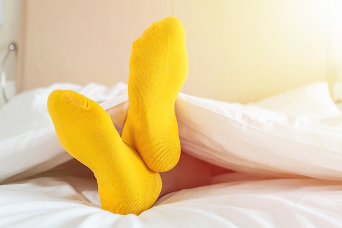 Is It Bad To Wear Socks To Bed?